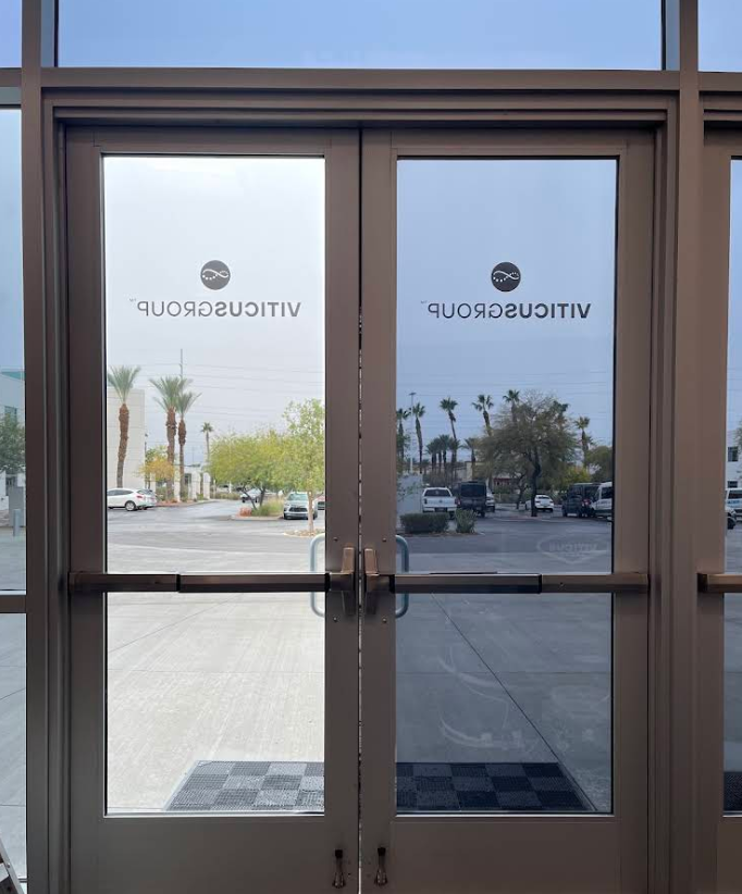 Commercial entry doors with privacy film for Viticus Group