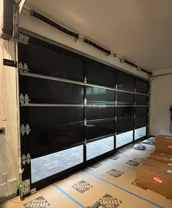 Garage door opening with dark screen style film