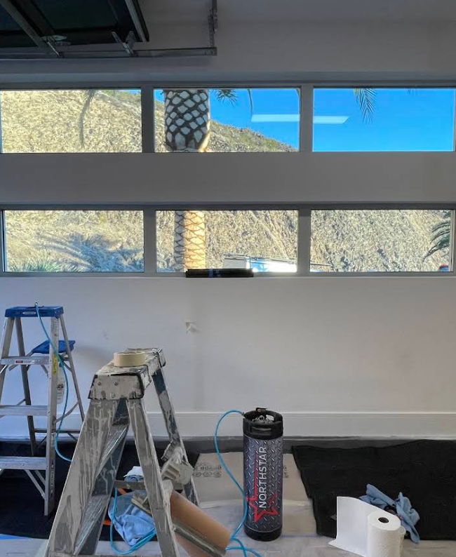 NorthStar technician working on upper residential windows