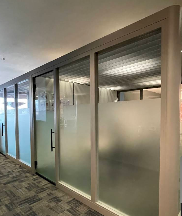 Modern office partitions with frosted privacy film